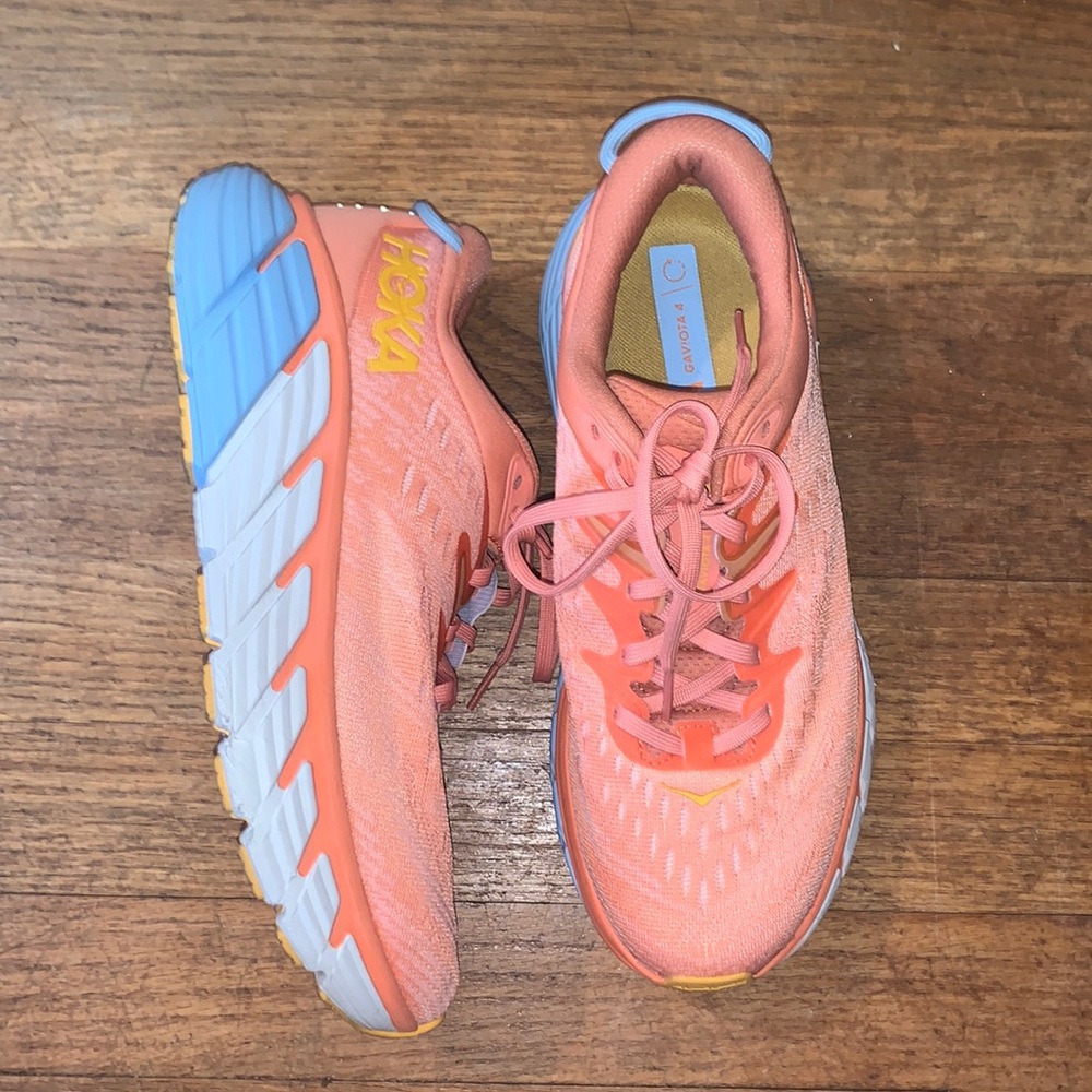 Orange, baby blue and white Gaviota HOKA shoes